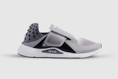 Grey recovery shoes with a 360-degree strap, acupressure dots, a wide toe box, and an integrated icing system